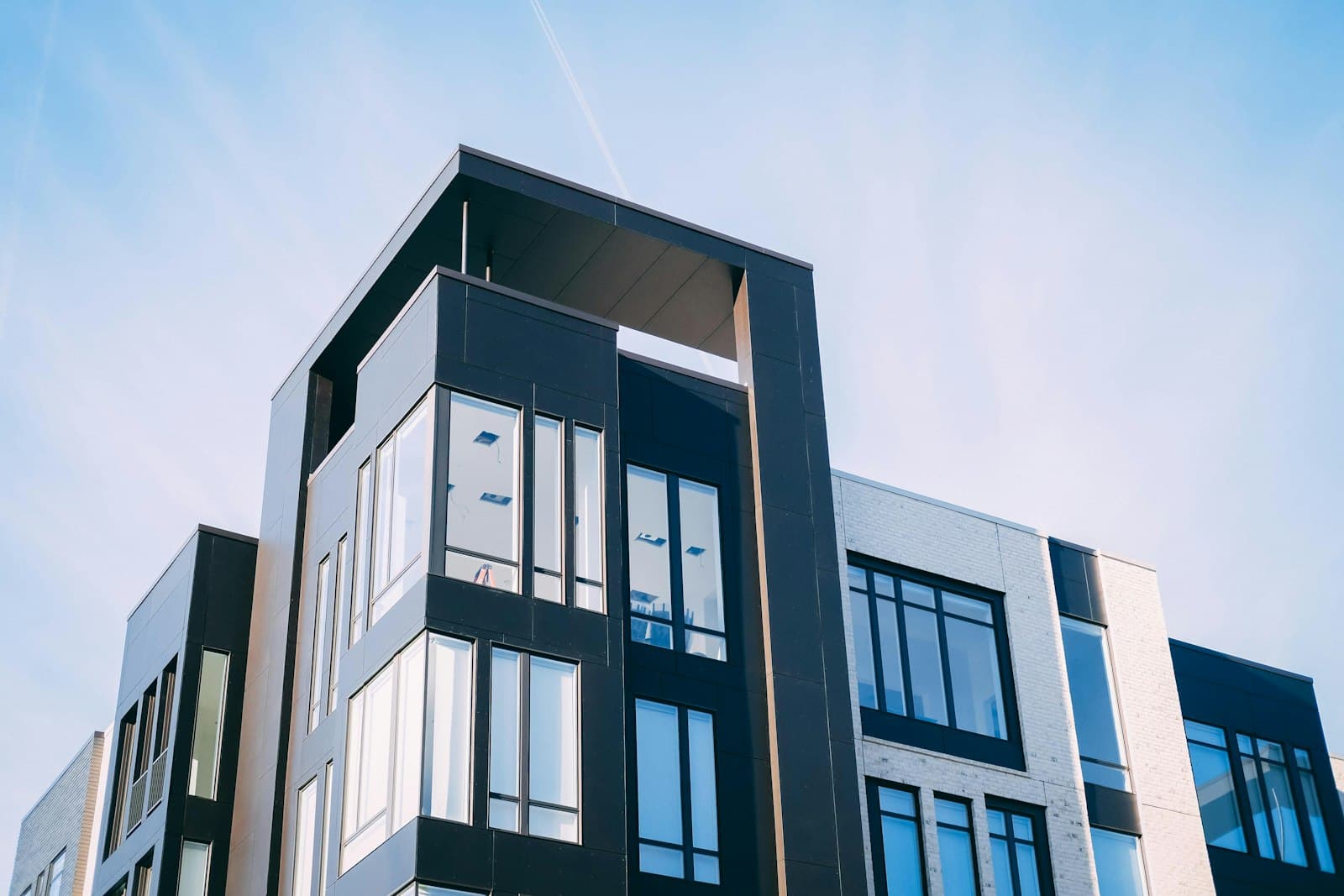 Modern residential building with dark window frames